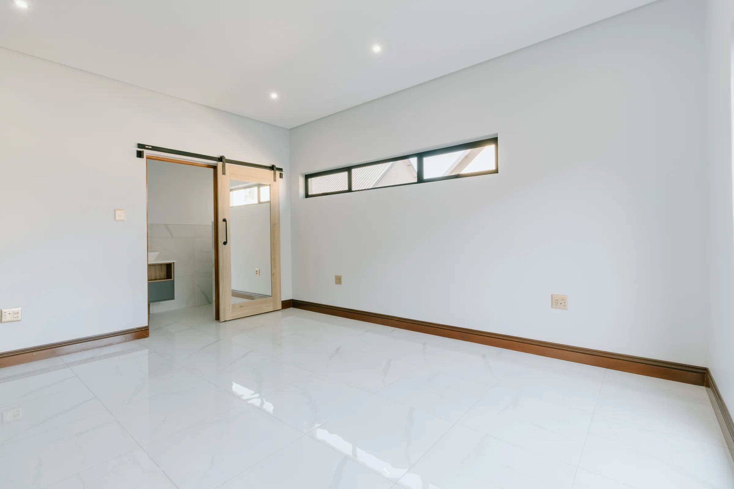 Editorial interior of Leloko Estate guest bedroom, Hartbeespoort — daylight photography by TimeSake Media